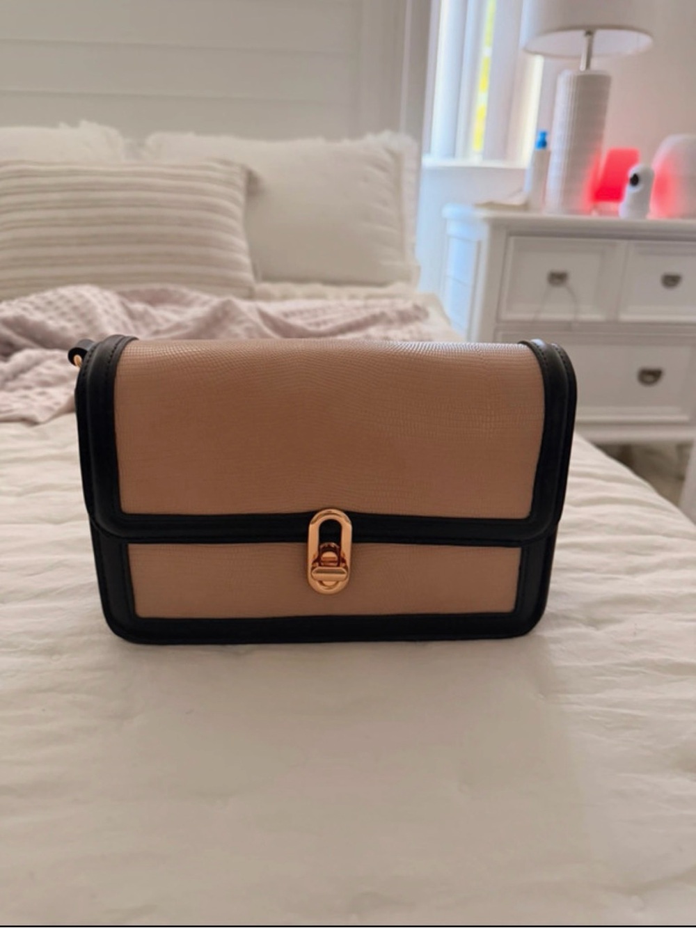 Two-Tone Beige and Black Crossbody Bag with Gold Clasp